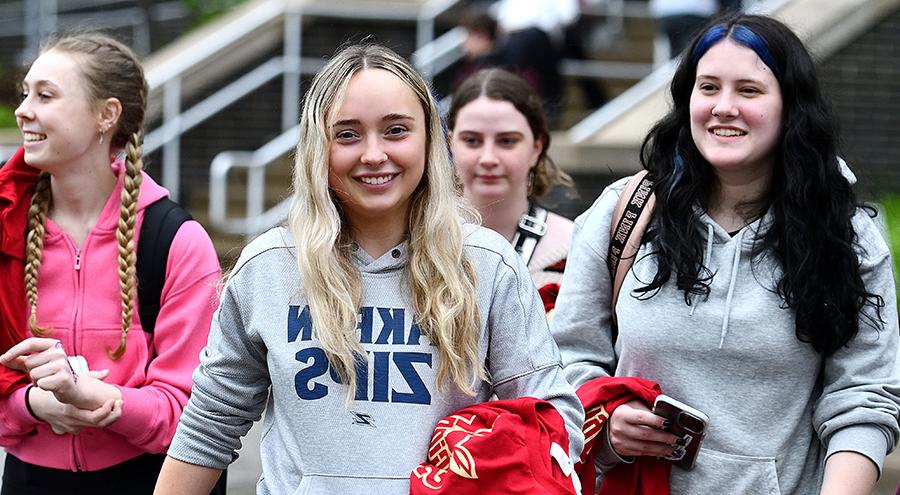 The University of Akron student posing on campus